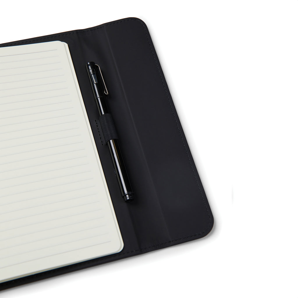 Cuaderno de PU y papel